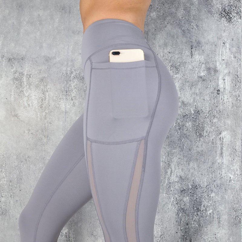 Schnell trocknende Mesh-Stitching kurz geschnittene Sport-Fitness-Yoga-Leggings